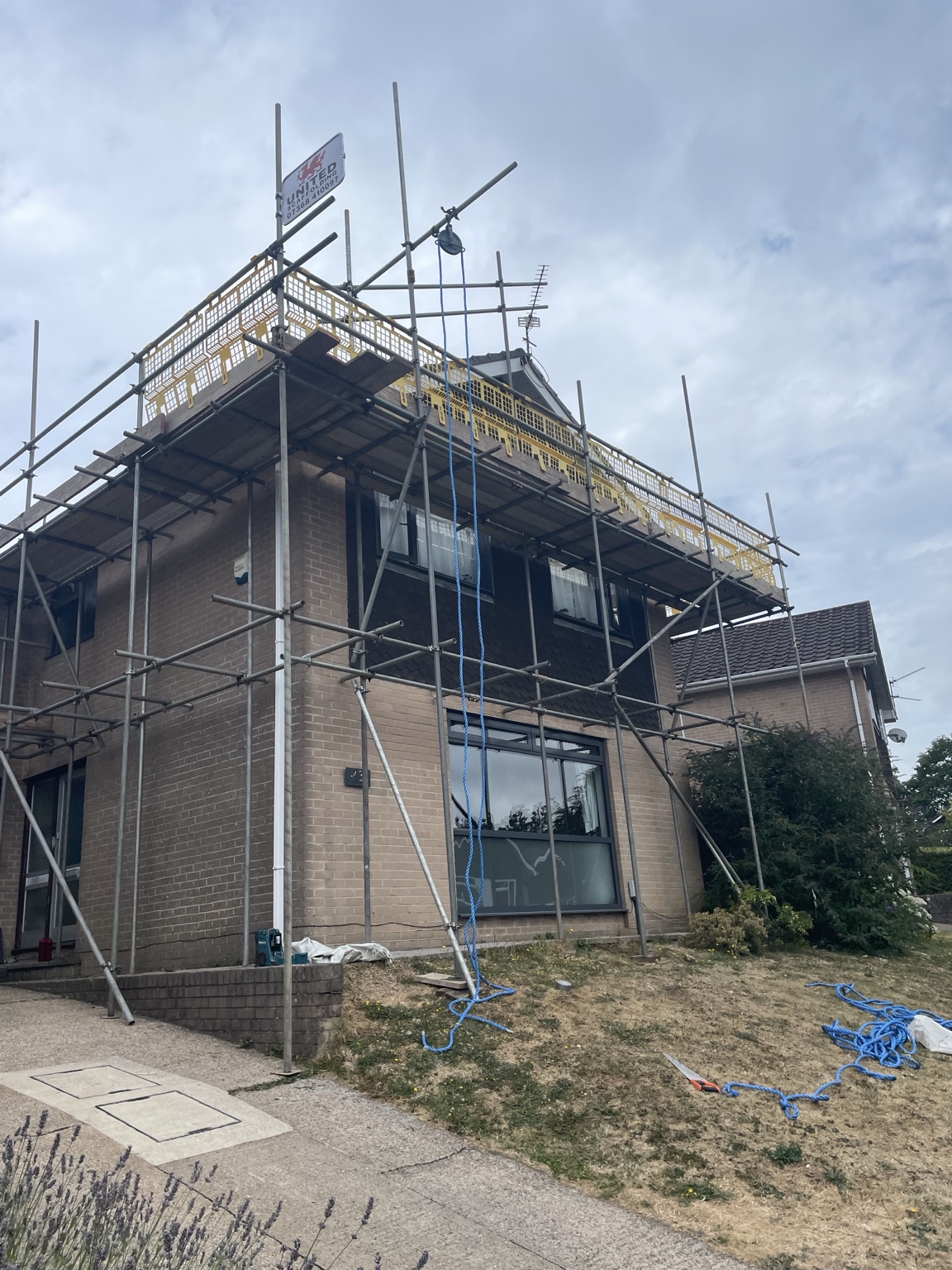 Scaffolding with yellow edge protection